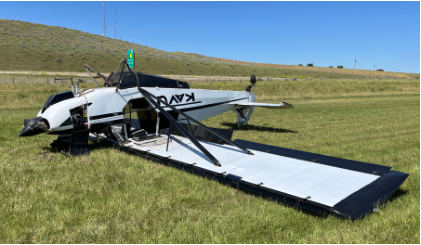 Photo 1 – Accident airplane inverted at accident site, from the NTSB investigation of Amateur-built PA-12 REPLICA accident near Douglas, Wyoming, June 22, 2024