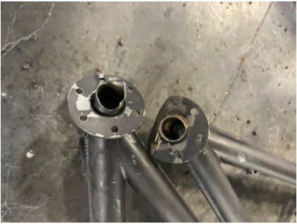 Photo 8 – Main landing gear axles from accident airplane with fractures, from the NTSB investigation of Amateur-built PA-12 REPLICA accident near Douglas, Wyoming, June 22, 2024