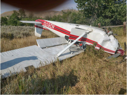 Photograph 1 – View of substantial damage to the left wing lift strut and damage to the horizontal stabilizer, from the NTSB investigation of Cessna 182B accident near Soldier, Idaho, July 13, 2024