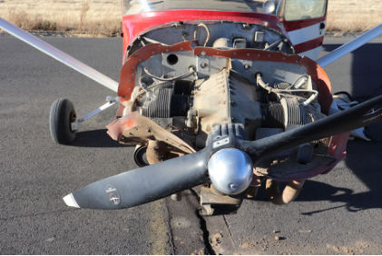 Photograph 4 – Front view of accident airplane engine during exam, from the NTSB investigation of Cessna 150M accident near Ritzville, Washington, July 15, 2024