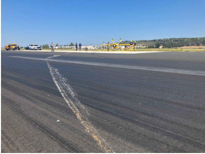 ONSITE INVESTIGATION PHOTOGRAPHS Photograph 5 – Accident site, runway impact marks., from the NTSB investigation of Boeing A75N1(PT17) accident near Camarillo, California, July 25, 2024