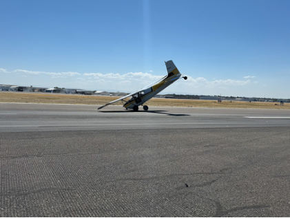 Photograph 2 – View of airplane from left., from the NTSB investigation of Cessna 180A accident near Boise, Idaho, August 17, 2024