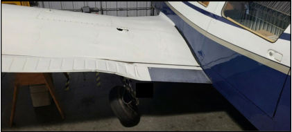 Photo 1 – View of airplane left wing, from the NTSB investigation of Piper PA-32-300 accident near Fallbrook, California, August 9, 2024