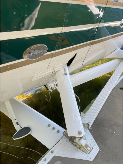 Photo 1 – View of damage to fuselage, from the NTSB investigation of Cessna T206H accident near Big Bend-Gold Bar, Washington, August 30, 2024