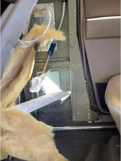 Photo 3 – View of damage to fuselage, from the NTSB investigation of Cessna T206H accident near Big Bend-Gold Bar, Washington, August 30, 2024