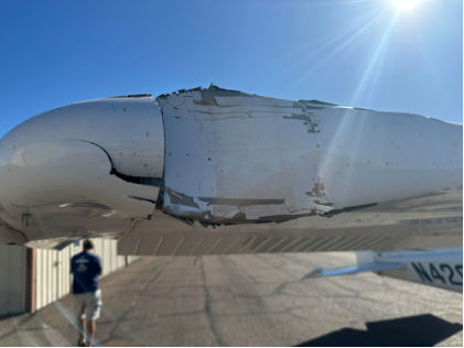 Photograph 2 – Airplane’s right wing as viewed from the front., from the NTSB investigation of Cessna 172S accident near Chandler, Arizona, May 11, 2024