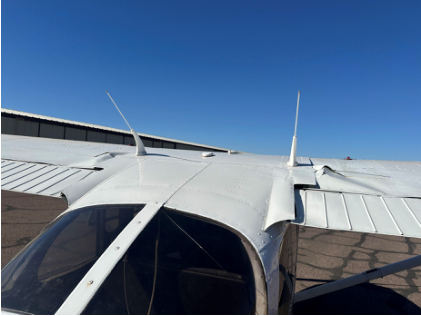 Photograph 3 – Airplane’s top of wings as viewed from the rear., from the NTSB investigation of Cessna 172S accident near Chandler, Arizona, May 11, 2024