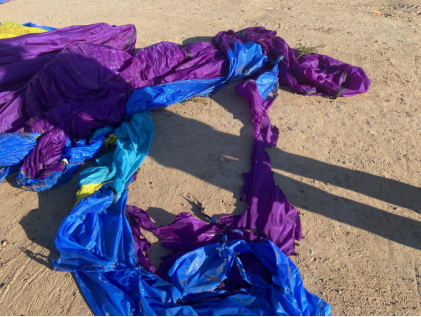 Photograph 2 – Accident site, envelope damage., from the NTSB investigation of Lindstrand 80E accident near Albuquerque, New Mexico, October 12, 2024
