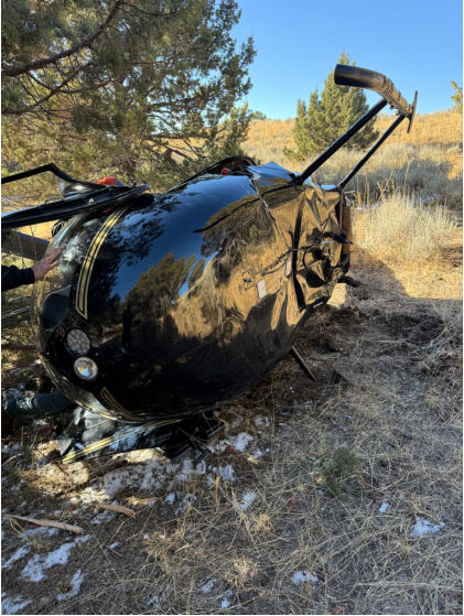 Photograph 1 – N4361R at the accident site., from the NTSB investigation of Robinson Helicopter Company R44 II accident near Durkee, Oregon, November 7, 2024