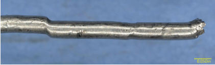 INVESTIGATION PHOTOGRAPHS-MAT LAB Photograph 4 – Wire profile. (40x) Photograph 7 - Caption of photograph, from the NTSB investigation of Cessna 172I accident near Mayer, Arizona, November 17, 2024