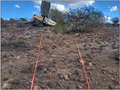 Photograph 2 – Accident site, main wreckage and impact marks., from the NTSB investigation of Cessna 172I accident near Mayer, Arizona, November 17, 2024