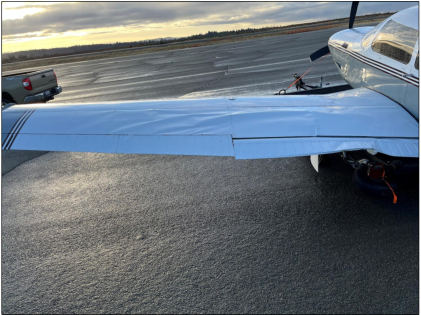 Photograph 2 – Airplane recovery photo of the left wing., from the NTSB investigation of Piper PA-28RT-201T accident near Placerville, California, December 20, 2024