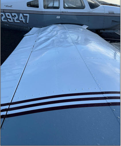 Photograph 3 – Airplane recovery photo of the right wing., from the NTSB investigation of Piper PA-28RT-201T accident near Placerville, California, December 20, 2024