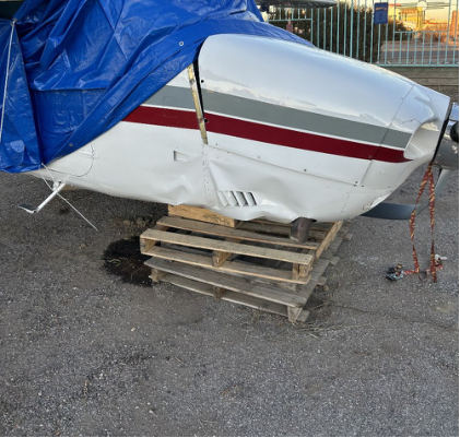 Photograph 2 – The airplane after removal from the accident site., from the NTSB investigation of Cessna T210L accident near Gallup, New Mexico, December 28, 2024