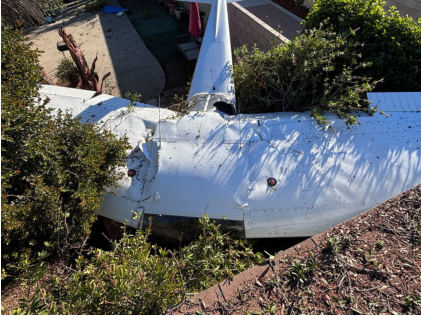 Photograph 2 – Top view of substantial damage to both wings, from the NTSB investigation of Cessna 150D accident near Temple City, California, January 6, 2025