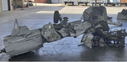Photograph 3 – Left wing and fuselage during initial layout, from the NTSB investigation of Piper PA-32-300 accident near Round Mountain, Nevada, January 2, 2025