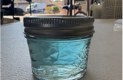 Photograph 3 – The fuel recovered from the right fuel tank, from the NTSB investigation of Cessna 140 accident near Salome, Arizona, February 9, 2025