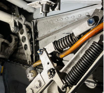 Photograph 4 – The landing gear up limit and downlock switches on a different Beech C90A., from the NTSB investigation of Beech C90A accident near Helena, Montana, March 16, 2025
