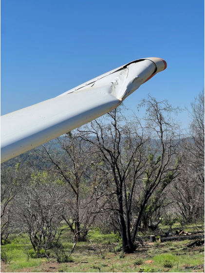 Photograph 2 – Left wing damage., from the NTSB investigation of Cessna 150 accident near Placerville, California, April 19, 2025