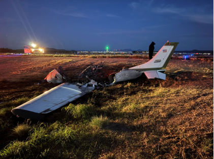 Photograph 1 – The airplane viewed from the left., from the NTSB investigation of Cessna 182L accident near Tucson Estates, Arizona, July 27, 2025