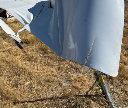 Photograph 1 – View of damage to right wing., from the NTSB investigation of Amateur-built HARTLINE KITFOX III accident near Logan, Utah, July 22, 2025