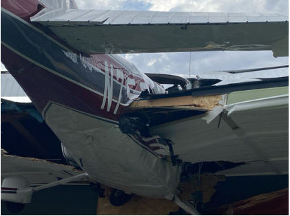 Photograph 1 – View of damage to fuselage., from the NTSB investigation of Cessna 182Q accident near Cashmere, Washington, July 31, 2025