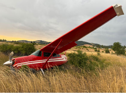 Photograph 1 – Airplane at accident site, from the NTSB investigation of Cessna 180J accident near Kamiah, Idaho, August 1, 2025