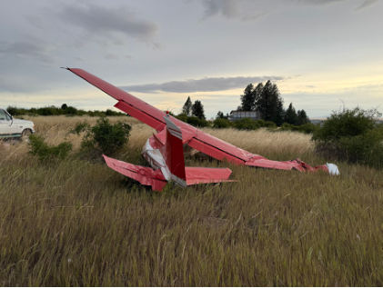 Photograph 2 – Airplane at accident site, from the NTSB investigation of Cessna 180J accident near Kamiah, Idaho, August 1, 2025