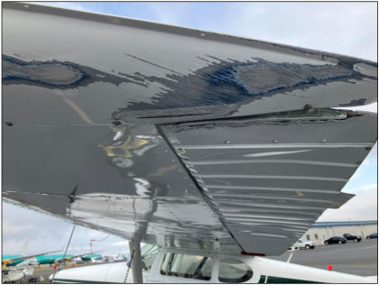 Photograph 3 – Left wing tip fairing damage., from the NTSB investigation of Cessna 170A accident near Everett, Washington, August 27, 2025