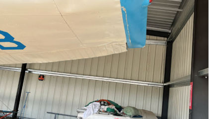 Photograph 1 – A view of substantial damage to the left wing., from the NTSB investigation of Cessna 180 accident near Reno, Nevada, September 3, 2025