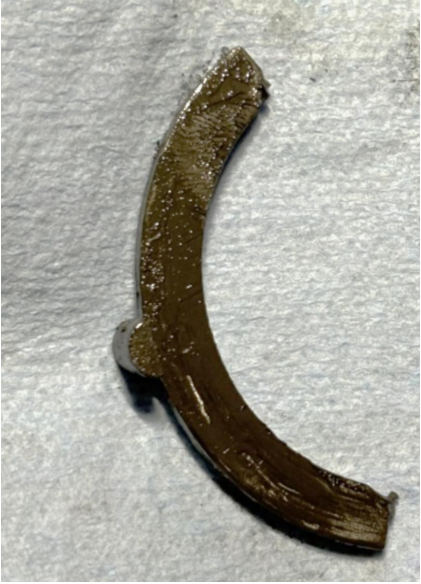 Photograph 8 – Tailwheel pawl, before grease removal, from the NTSB investigation of Cessna 305 accident near Phoenix, Arizona, October 18, 2025
