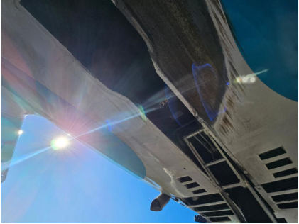Photograph 1 – Carbon Fiber Abrasion right of nose-gear, from the NTSB investigation of Amateur-built Risen SV accident near Carson City, Nevada, December 13, 2025