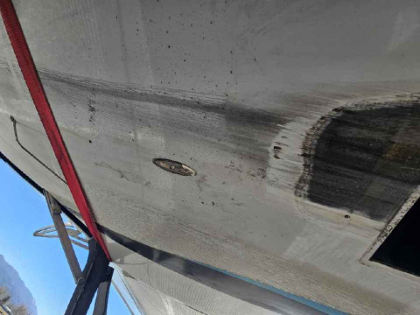 Photograph 3 – Carbon Fiber Abrasion on belly, from the NTSB investigation of Amateur-built Risen SV accident near Carson City, Nevada, December 13, 2025