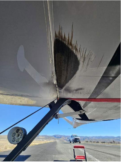 Photograph 6 – Carbon Fiber Abrasion on belly, from the NTSB investigation of Amateur-built Risen SV accident near Carson City, Nevada, December 13, 2025