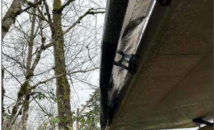Photograph 5 – Accident site, right wing damage., from the NTSB investigation of Amateur-built 750 accident near Yacolt, Washington, December 23, 2025