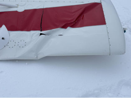 Photograph 4 – View of right wing damage (Sheriff’s Office), from the NTSB investigation of American Champion Aircraft 8KCAB accident near Alpine, Wyoming, January 29, 2026