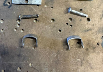 Photograph 6 – Right seat rail forward stop mounting hardware (Club maintenance director), from the NTSB investigation of Cessna 172M accident near Nampa, Idaho, February 5, 2026