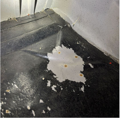 Photograph 4 – View of damage to the right-side floorboard, from the NTSB investigation of Remos Acft GMBH Flugzeugbau REMOS GX accident near Glendale, Arizona, February 26, 2026
