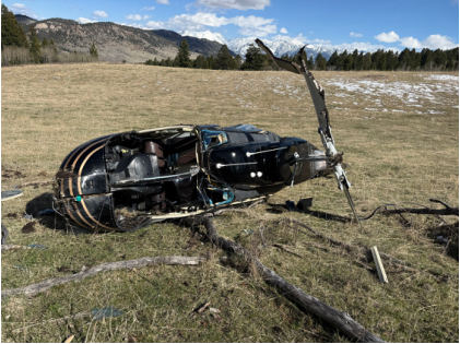 Photograph 1 – View of wreckage from front left., from the NTSB investigation of Bell Helicopter Textron 206L-1 accident near Chimney Rock, Montana, April 4, 2026