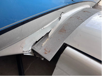 Photograph 2 – Top view of broken wing root, from the NTSB investigation of Cirrus Design CORP SR22T accident near Vernal, Utah, May 16, 2026