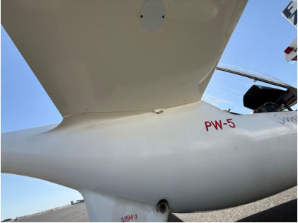 Photograph 3 – View of puncture under right wing., from the NTSB investigation of Pzl-Swidnik PW-5 accident near Soap Lake, Washington, May 23, 2026