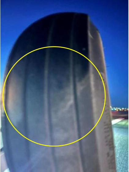 Photograph 5 – View of left main landing gear tire wear marks, from the NTSB investigation of Cessna 140 accident near Pasco, Washington, June 1, 2026