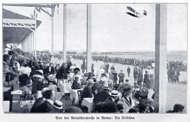 A French-Built Wright Biplane Flies in Front of the Packed Grandstand