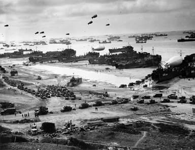 Barrage Balloons Protecting Cargo Vessels During Battle of Normandy
