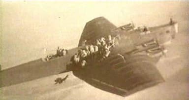 Paratroopers Jumping from a Tupolev TB-3