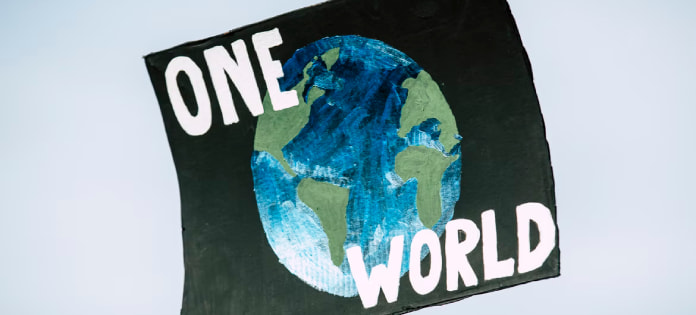 Poster with a globe and text One World
